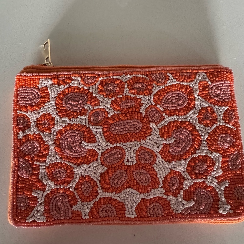Orange beaded clutch